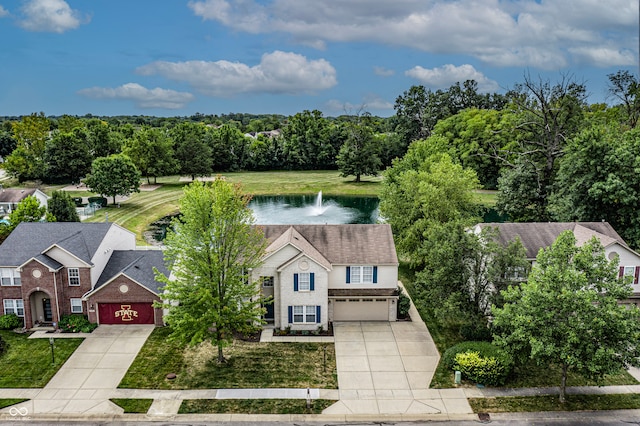 birds eye view of property featuring a water view