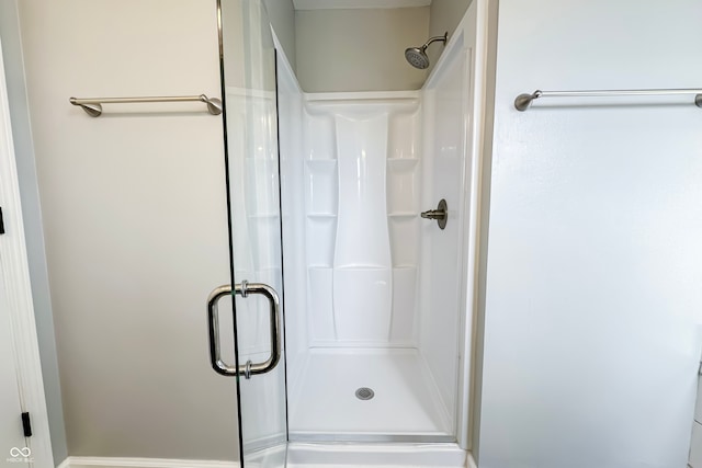 bathroom with an enclosed shower