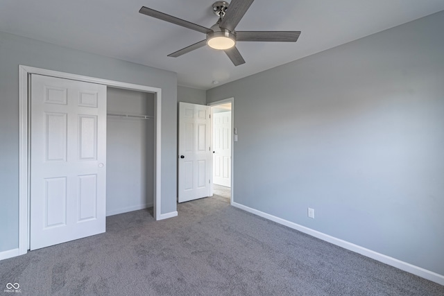 unfurnished bedroom featuring carpet, a closet, and ceiling fan