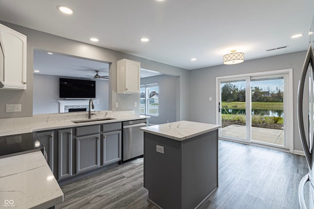 kitchen featuring gray cabinetry, sink, plenty of natural light, and appliances with stainless steel finishes