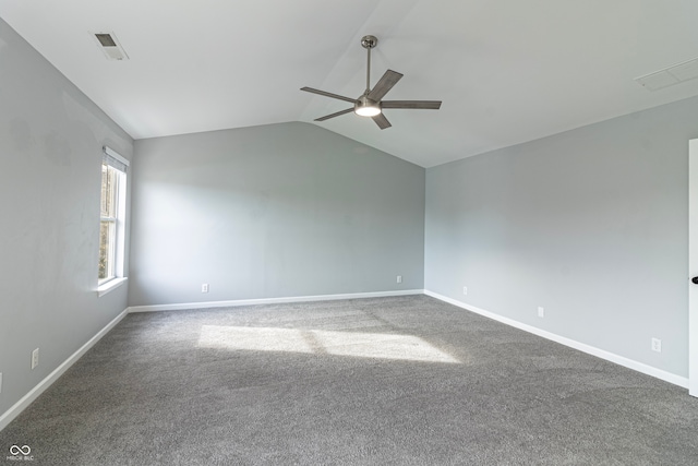 spare room featuring carpet flooring, ceiling fan, and lofted ceiling