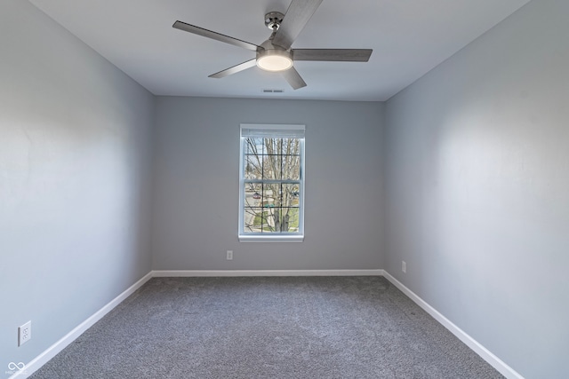 unfurnished room with carpet floors and ceiling fan