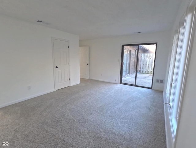 view of carpeted spare room