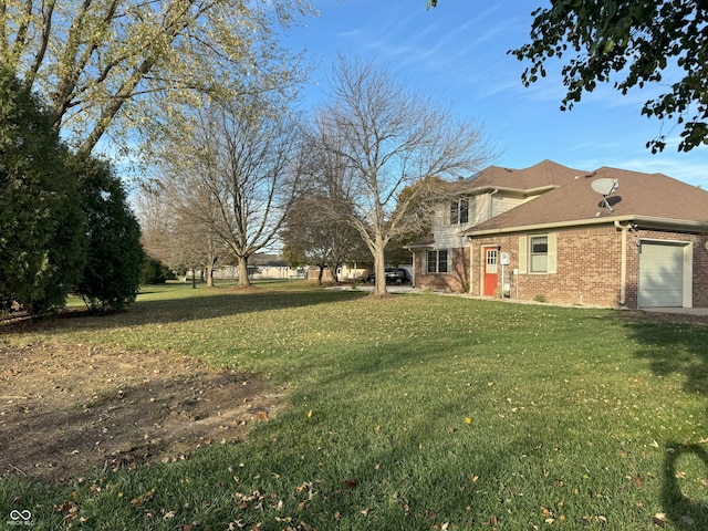 view of yard with a garage