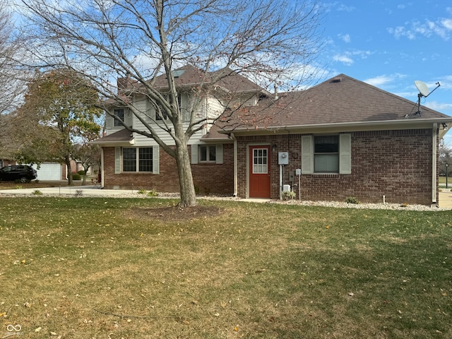 view of front facade featuring a garage and a front yard