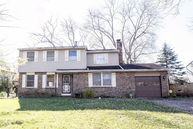 front of property with a garage and a front yard