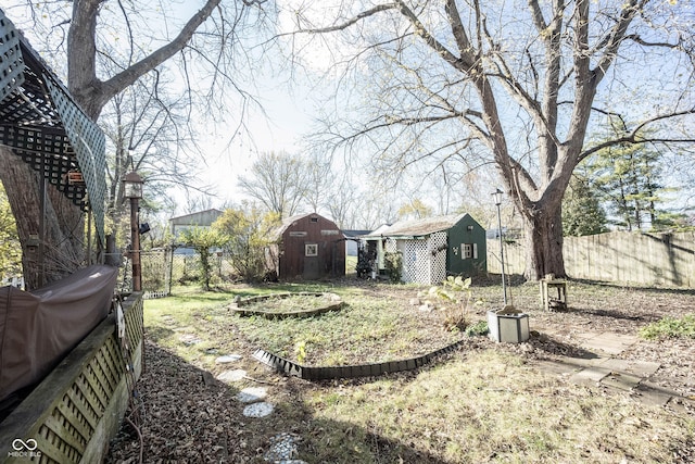 view of yard with a storage unit