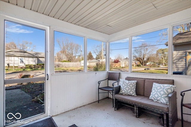 unfurnished sunroom with a healthy amount of sunlight