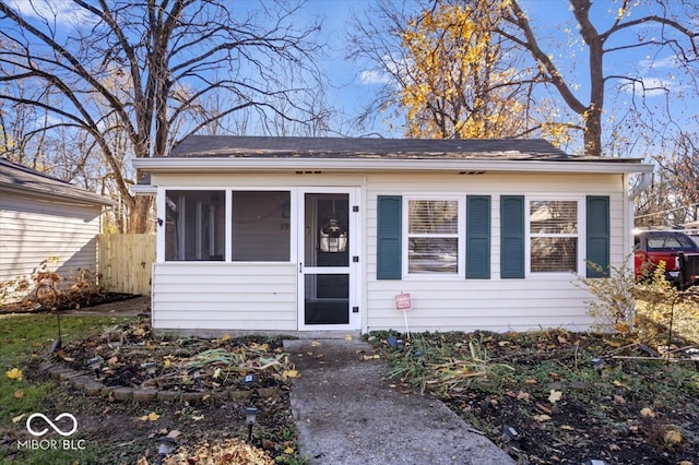 bungalow featuring a sunroom