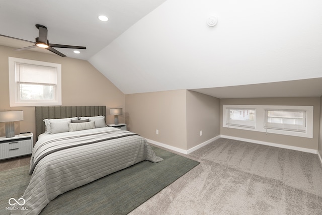 carpeted bedroom with lofted ceiling and ceiling fan