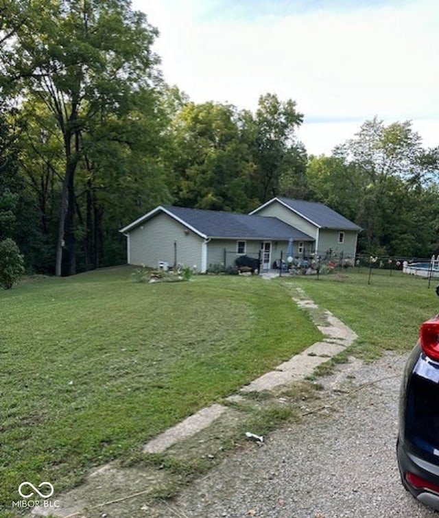 view of front of house with a front lawn