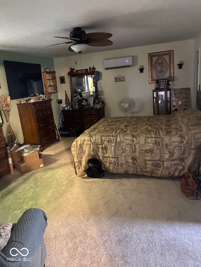 bedroom with an AC wall unit, ceiling fan, and carpet floors