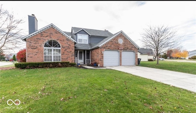 view of front property with a garage and a front yard