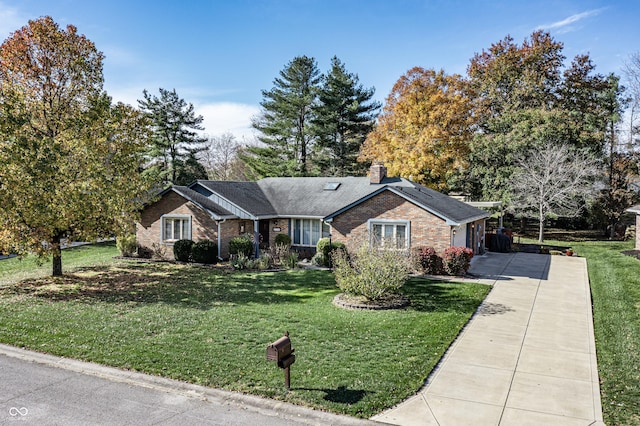 ranch-style house featuring a front yard