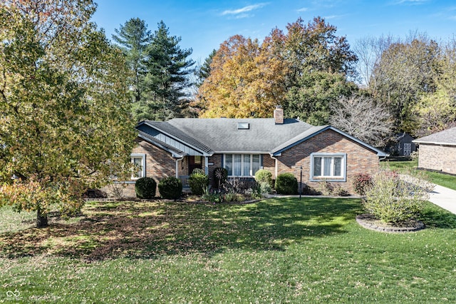 view of front facade with a front lawn