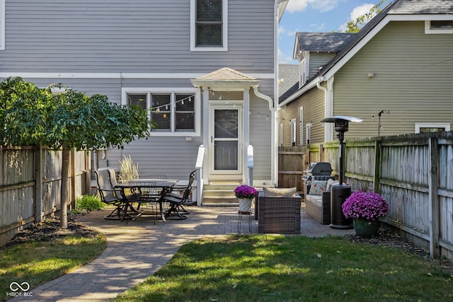 exterior space with a lawn and a patio area