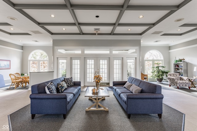 tiled living room with coffered ceiling, a healthy amount of sunlight, and beam ceiling