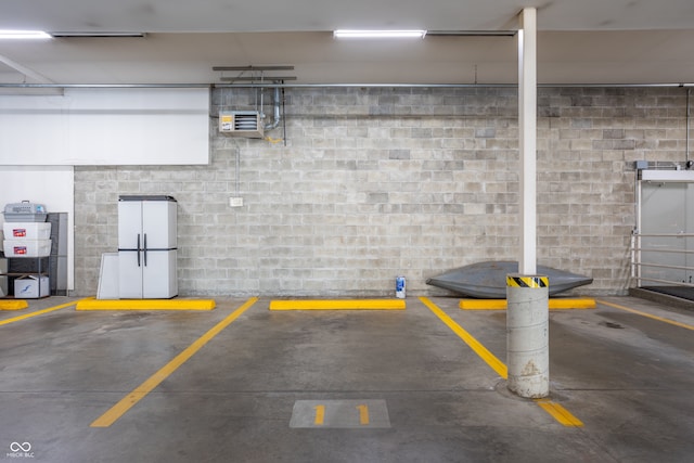 garage with white fridge