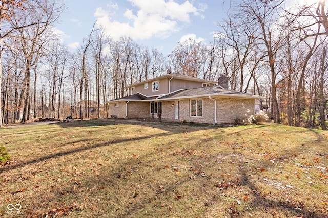 view of home's exterior featuring a yard