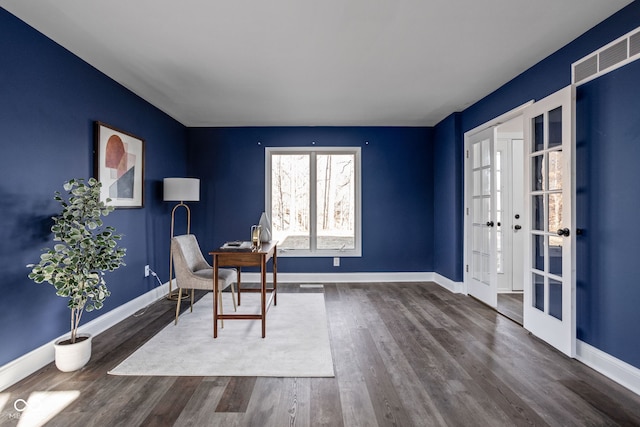 unfurnished office with french doors and dark wood-type flooring