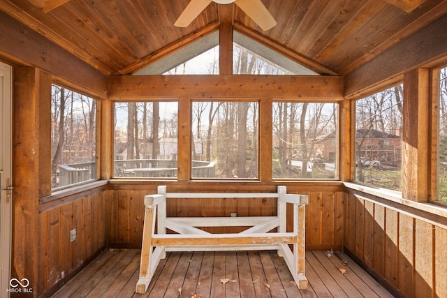 unfurnished sunroom featuring vaulted ceiling, ceiling fan, and wood ceiling