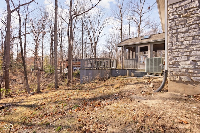 view of yard featuring a sunroom