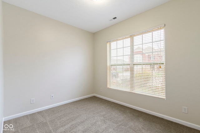 view of carpeted spare room