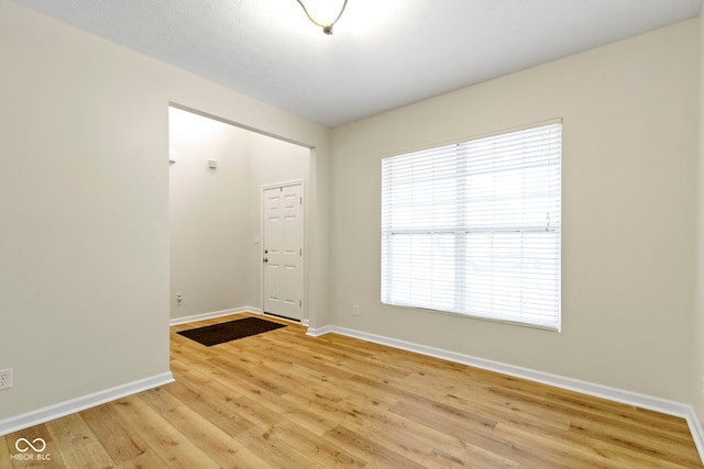 empty room featuring light hardwood / wood-style floors