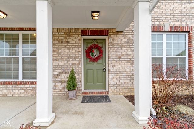 entrance to property with a porch