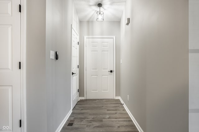 hall featuring hardwood / wood-style flooring