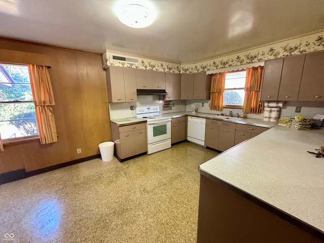 kitchen featuring sink and white appliances