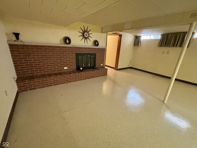 basement with a fireplace