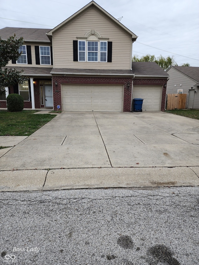 front of property with a garage