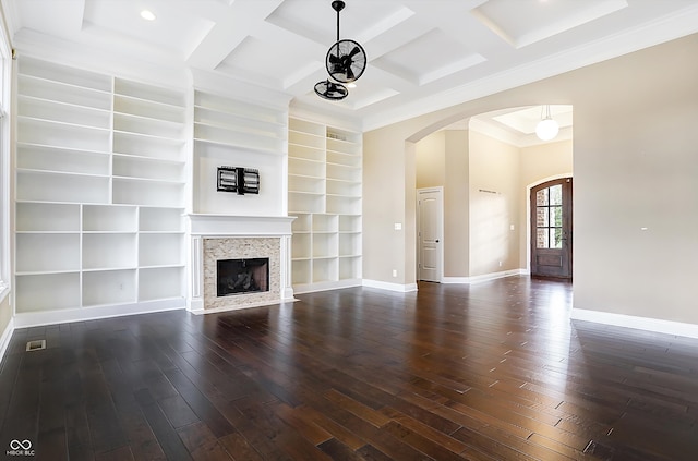 unfurnished living room with coffered ceiling, dark hardwood / wood-style floors, and beam ceiling