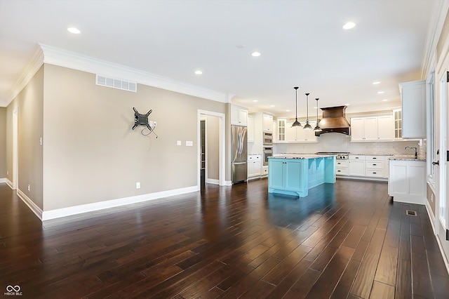 kitchen featuring stainless steel appliances, dark hardwood / wood-style floors, premium range hood, a center island, and pendant lighting