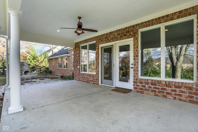 view of patio featuring ceiling fan