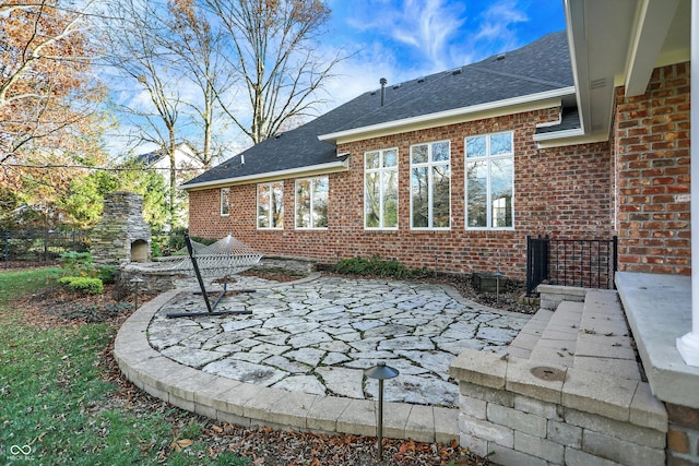 rear view of house featuring a patio area