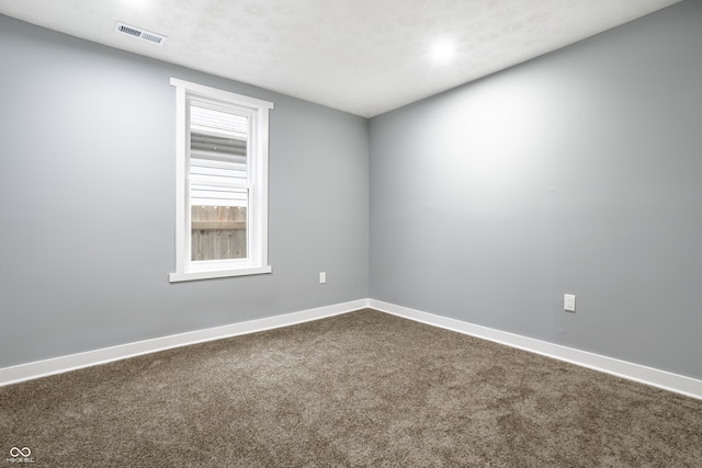 unfurnished room with carpet