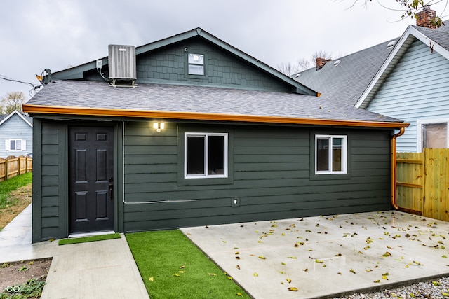 back of property featuring a patio area