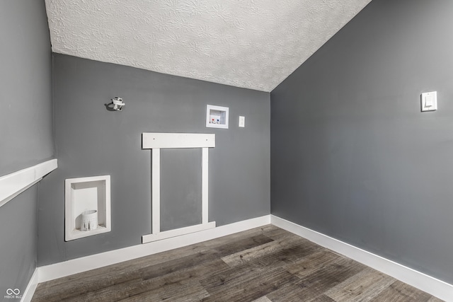 1621 Draper St, Indianapolis, IN 46203 - laundry view of a textured ceiling, wood finished floors, and baseboards