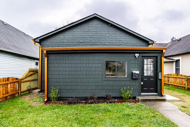 exterior space featuring a front yard