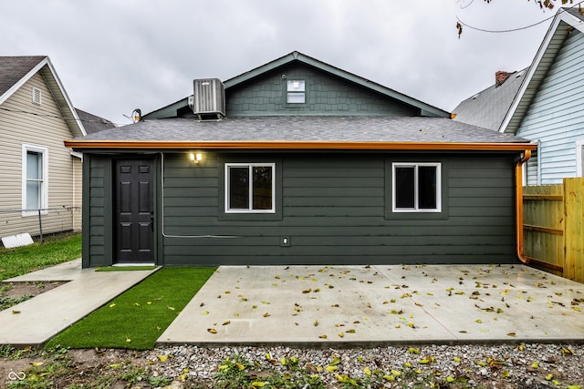 1621 Draper St, Indianapolis, IN 46203 - back of property with central AC and a patio area