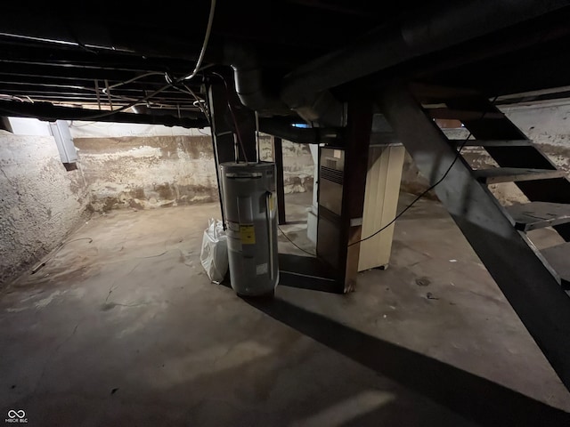 basement featuring electric water heater