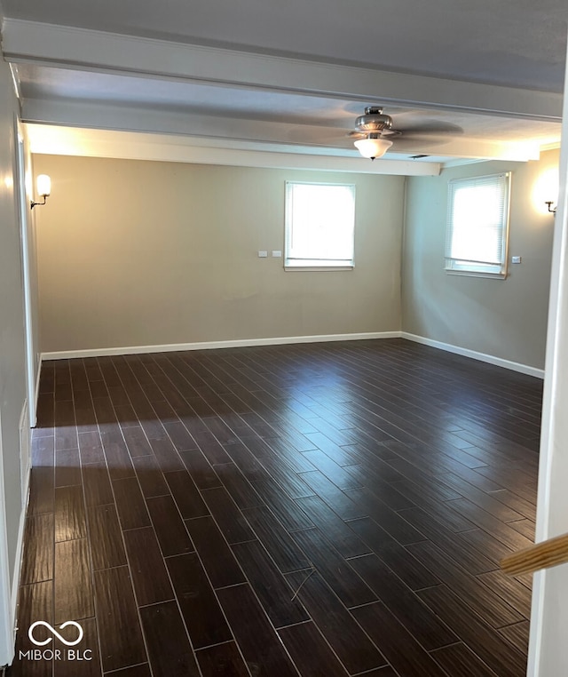 unfurnished room with a wealth of natural light and dark hardwood / wood-style flooring