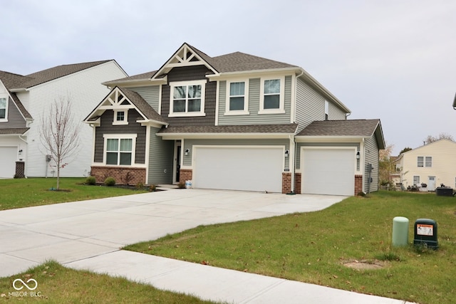 craftsman-style house featuring a garage and a front yard