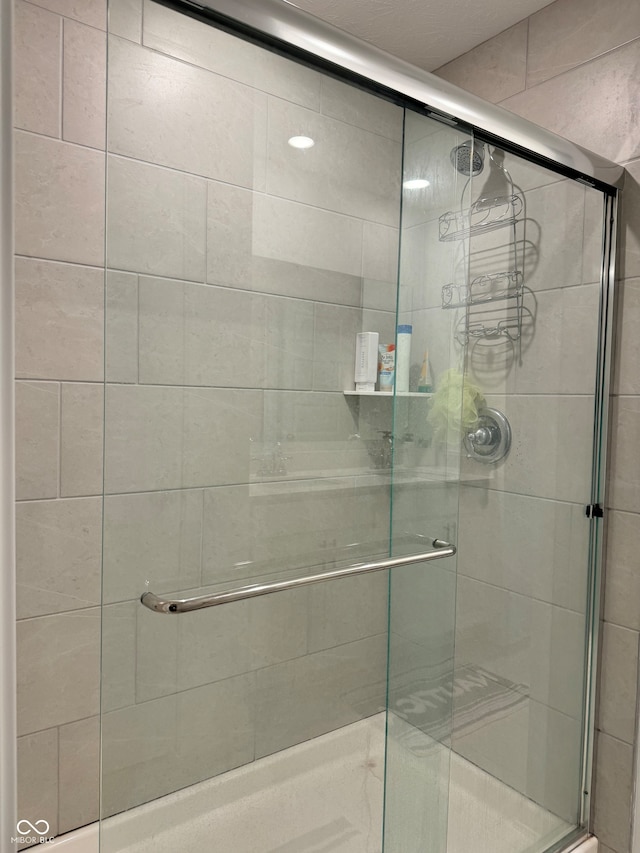 bathroom with an enclosed shower