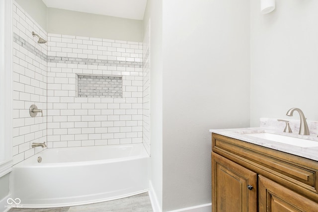 408 W 11th St, Anderson, IN 46016 - bathroom featuring vanity, shower / tub combination, baseboards, and wood finished floors