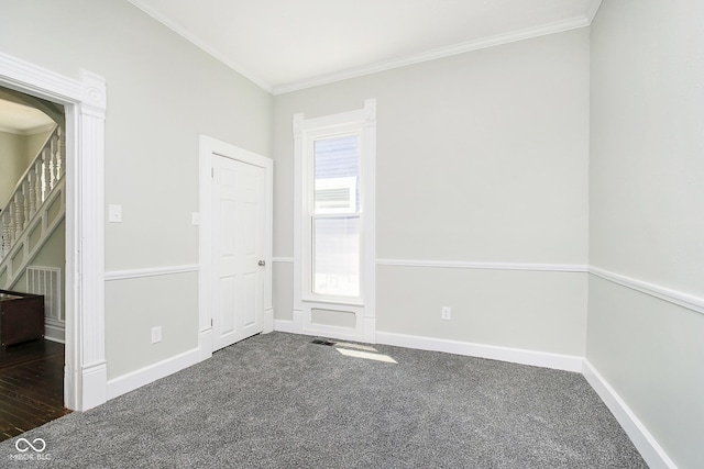 408 W 11th St, Anderson, IN 46016 - unfurnished bedroom featuring ornamental molding, baseboards, and carpet flooring