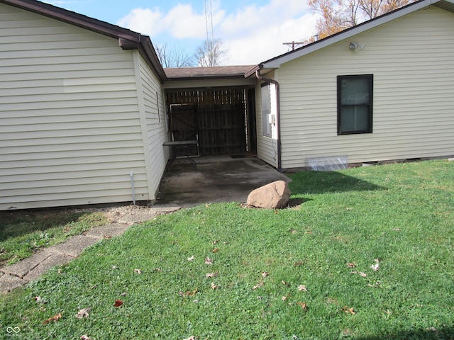 view of property exterior with a lawn