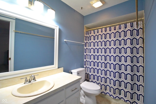 bathroom with a shower with shower curtain, vanity, toilet, and a textured ceiling